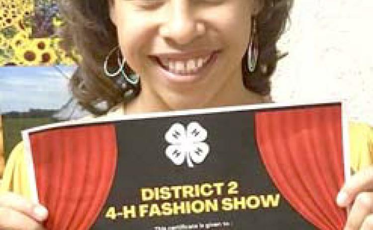 Castro County 4-H Jaycee Cantrell competed in the District 2 Fashion Show in the Junior Fashion under $25. She bought her outfi t at thrift stores for less than $25. She presented on comparison buying techniques, fiber content and care of garment, and more, and won 1st place in the category.