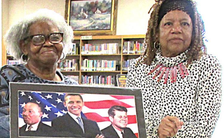 Library Display for February features Black History Month with Gwen Lewis, left, and Joyce Thomas exhibiting items relating to the Buffalo Soldiers.