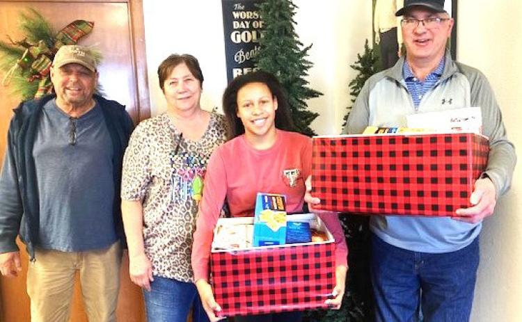 Food boxes were collected at the Dimmitt Country Club to help needy families during the holiday.