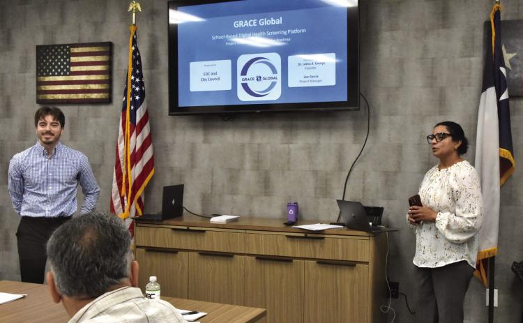PITCHING FOR SEED MONEY--Dr. Lekha George, MD, right, and Leo Garcia, third year medical student with the Texas Tech Health Sciences Center proposed a community health and workforce development initiative and requested startup money from the Hereford Economic Development Corporation by May 2. The HEDC board tabled the matter until it can consult with other local bodies. (Photo by Jim Steiert)