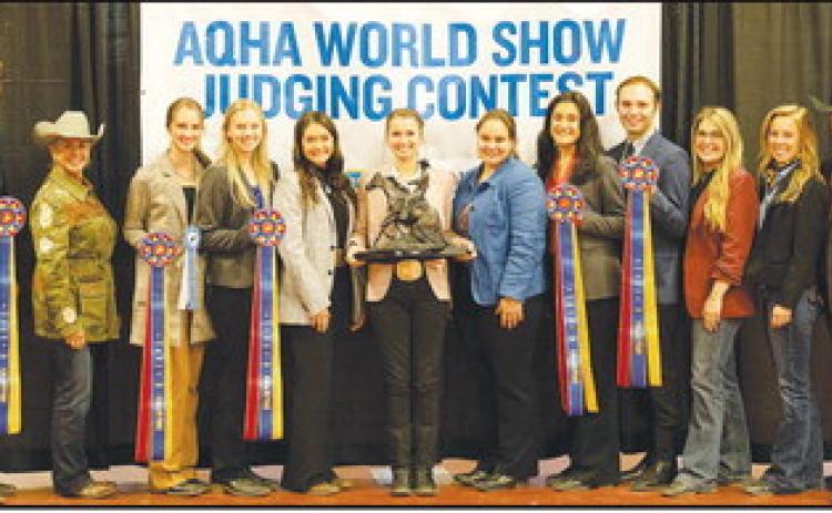 The West Texas A&amp;M University horse judging team recently won two major championships, including the National Reining Championship. Pictured are team members Trenton Hammerand,National Reining Horse Association representative Patti Carter, Lauryn Harris, Jennica Dannehl, Shanna Marquart, Anna Wilhelm, Anya Katz, Jillian Melendez, Marty Kacsh, Makenzie Knipe, Maggie Murphy and Coach John Pipkin. (Photo provided by WTAMU)