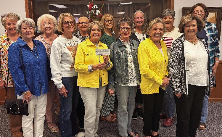Progressive Study Club presented a check to the Kress Fire Department from the Christmas Card Fund. Pictured are (back row) Cheryl Swinburn, Glenna Crooks, Jeanne Todd, Nancy Montague, Emily Keese, Ka Wilfong, Celeste Howard, (front row) Sheran Childress, Tangy Garrison, Jan Irlbeck, Sherry Malone, Marilyn Foster, and Judy McDaniel.