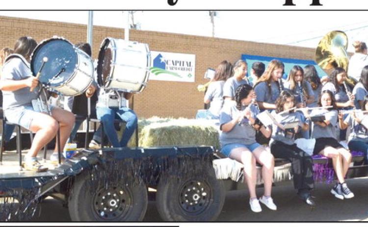 The DHS Band put on a ‘driving down the street’ performance during the Harvest Days Parade.