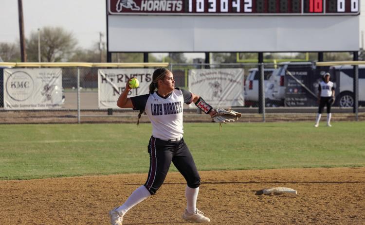 Shortstop Kyla Rodriguez makes the throw to 1st base