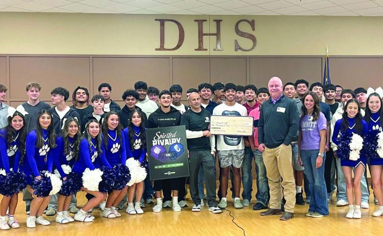 First United Bank donated $1,000 Thursday afternoon to Dimmitt High School as part of its Spirited Rivalry Campaign. Making the donation on behalf of First United Bank was Dimmitt Branch President Codi Cleavinger and Dimmit First United Bank Vice President Shelly Bills. (BRAND photo/Jeff Blackmon)