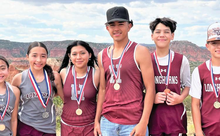 Hart Cross Country JH and HS Individual Medalists at the Valley Cross Country meet at Caprock Canyon – (left to right) Avilen Morales, JH girls 7th place; Lexi Cisneros, JH girls 2nd place; America Cardoza, Varsity girls 5th place; Aiden Cisneros, Varsity boys 9th place; Dael Longoria, JH boys 6th place; and Avram Morales, JH boys 1st place.