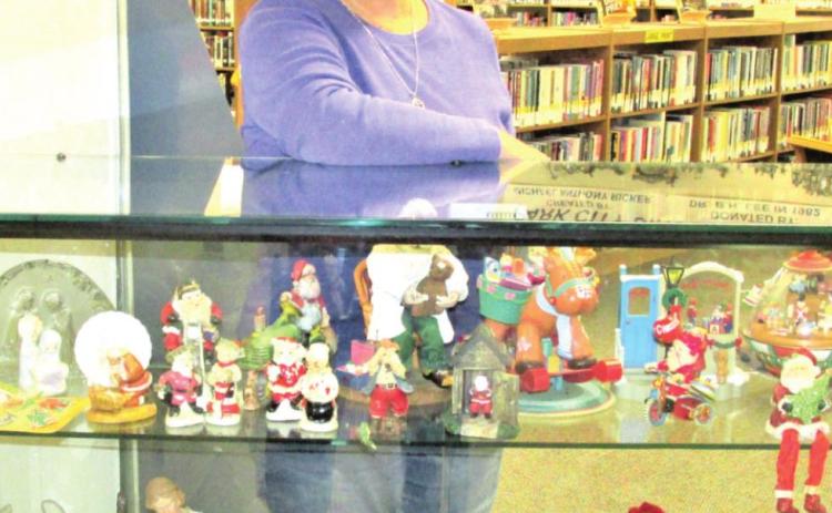 Gloria Hernandez is the featured Displayer of the Month with Christmas items and nativity scenes.