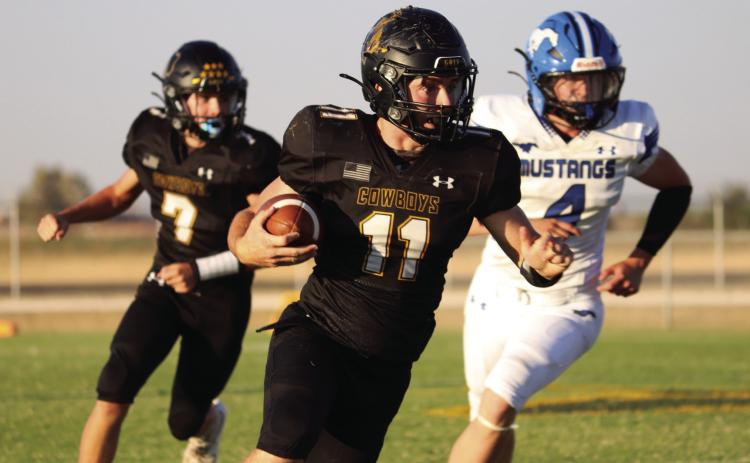 RUSHING TOWARDS GREATNESS With his sights on the end zone, senior Luke Dempsey skillfully runs the ball down the field on Sept. 18, 2026. Photos by Jessica Vasquez