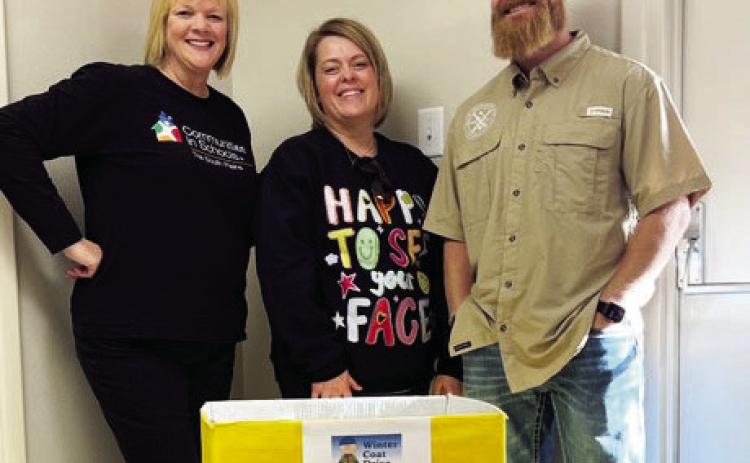 (From left) Kendra Cantrell-CIS Coordinator, Jessica Braddock and Jacob Schacher - Youth Group Volunteers.