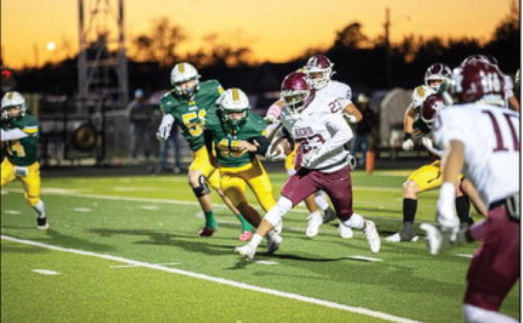 Zack Galvan bullies his way through the Pampa defensive line Friday night.