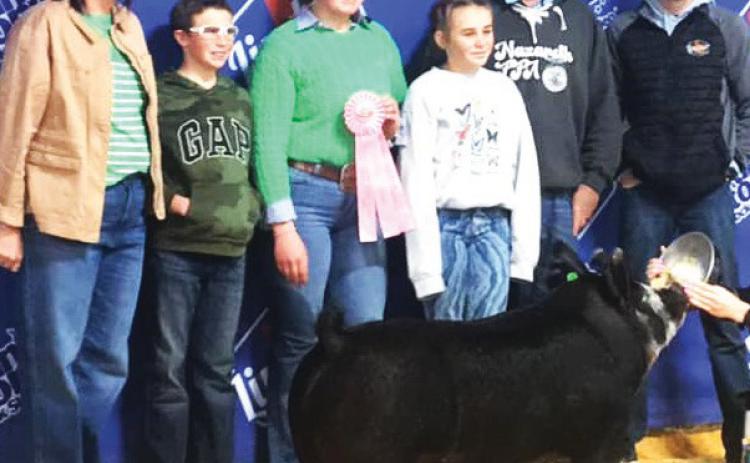 Nazareth FFA Autumn Birkenfeld competed and placed 4th and made the sale with her Berkshire at the San Antonio Livestock Show.