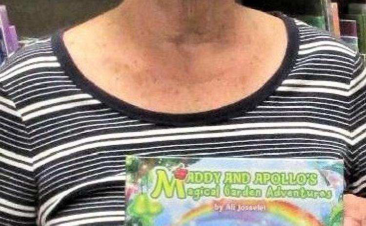 Pam Josselet donated the newly released children’s book, “Maddy and Apollo’s Magical Garden Adventures”, to Rhoads Memorial Library. The book is written by Ali Josselet and features a picky eater who learns how tasty fruits and vegetables can be.