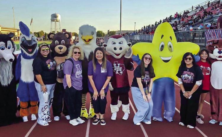 Last Friday night’s home football game against Canyon also served as a salute to elementary campuses across Hereford. Pictured above are mascots and representatives from each campus.