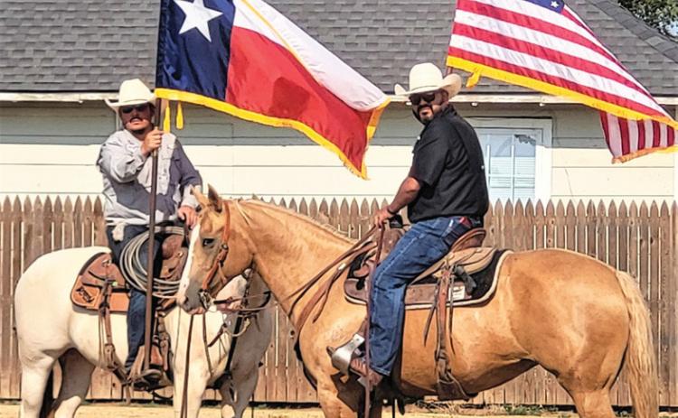 Cowboys Eloy Marquez and Alfredo Hernandez proudly carried the colors at the Hart Days Parade and Celebration.