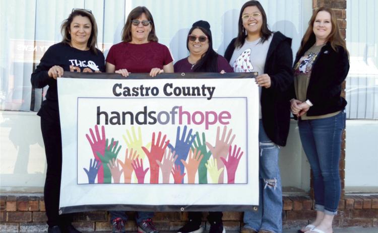 Castro County Hands of Hope board members Martha Ibarra, secretary/treasurer, Janet Sammann, vice president, Teresa Fuentes, Tori Jurado, and Kristina Holcomb, president, prepare to move into the new location at 113 W. Bedford with a start-up date of Nov. 17. City of Dimmitt Mayor Roger Malone and City Manager Daniel Jackson offered the city-owned location to house the organization.