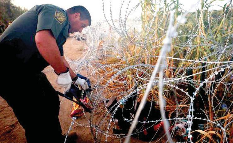 SCOTUS allows removal of wire on border
