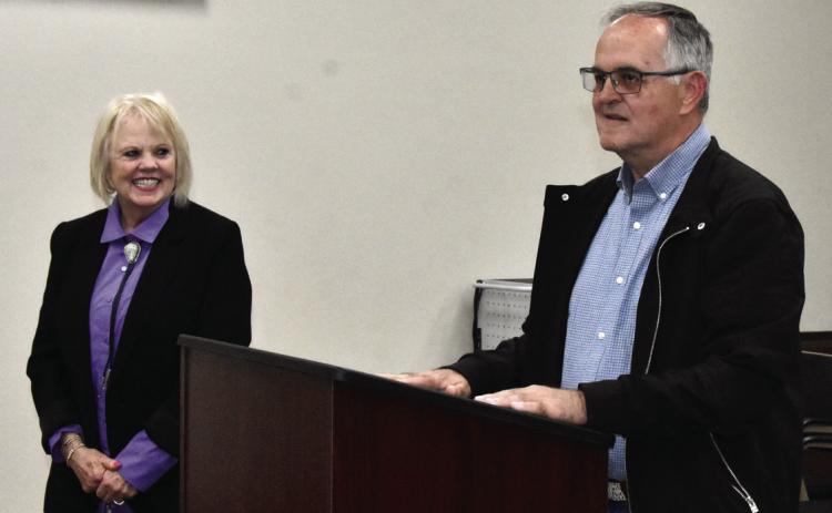 HE'D MAKE A GOOD ONE--At the April 20 City Commission meeting, Interim Municipal Court Judge Cindy Simons presented Kirk Spain as a potential Municipal Court Judge candidate, explaining that he had previously worked in Adult Probation for 21 years, also served as a patrol officer with the Hereford Police department for over five years, and served as a volunteer firefighter for 16 years. (Photo by Jim Steiert)