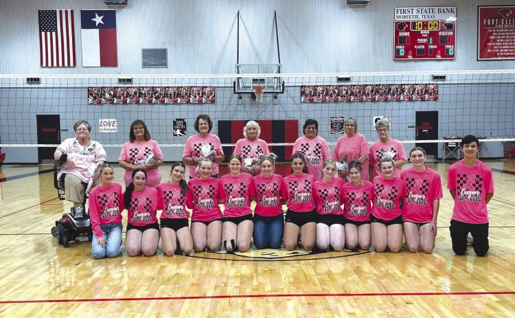 Fort Elliott was privileged to recognize community breast cancer survivors between volleyball games. Back row (Survivors): Teresa Rose, Donna Pigg, Charlene Heronama, Saretta Heard, Mandy Brown, Mindy Duncan, and Gina Seitz. Front Row: Slayde Rose, Tatum Pigg, Rylee Rose, Jaylie Dickey, Aliyah McCarter, Jaycee Sewell, Ali Mahler, Brylie Hand, McCauley Jernigan, Kennedee Sullivan, Jayla Dickey, Tazlan Brown (Courtesy Photo)