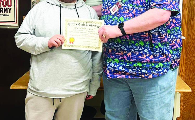 Bryan Tovar earned a $500 scholarship for his 1st place finish at the Red Raider Classic UIL Current Events Invitational. Tovar is pictured with Hereford High School teacher/UIL coach Richard Lamascus.