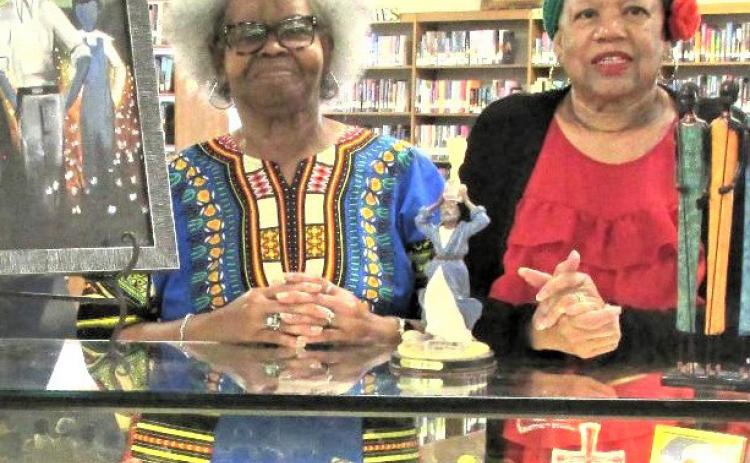 Displayer of the Month - Gwen Lewis and Joyce Thomas exhibiting items for Black History Month.