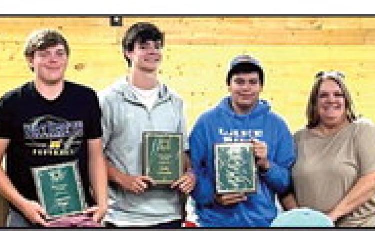 Castro County 4-H Gold Star Award - Caysen High, Luke Schulte and Harrison Meador, all from Nazareth, were presented their Gold Star plaques by Castro County AgriLife Extension Agent Felice Acker.