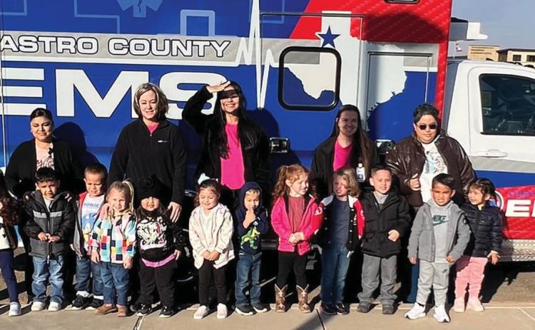Castro County EMS treated students at Richardson Elementary to a hands-on experience giving the youth a chance to see the emergency vehicles and meet EMS staff, right down to being put on stretchers.