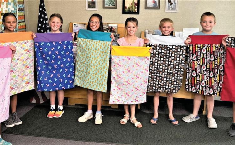 Castro County 4-Hers attended a pillowcase making workshop last Thursday morning. Eight youth attended to learn about their sewing machines, sew straight line, picked out accent and main fabrics, banding hidden seams, and French seams.