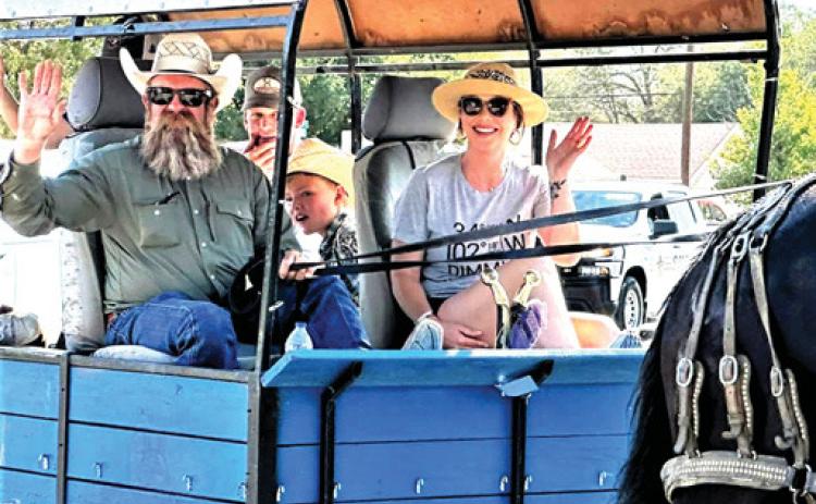Matt and Mandy Gfeller participated in the Harvest Days Parade with their wagon and horses.