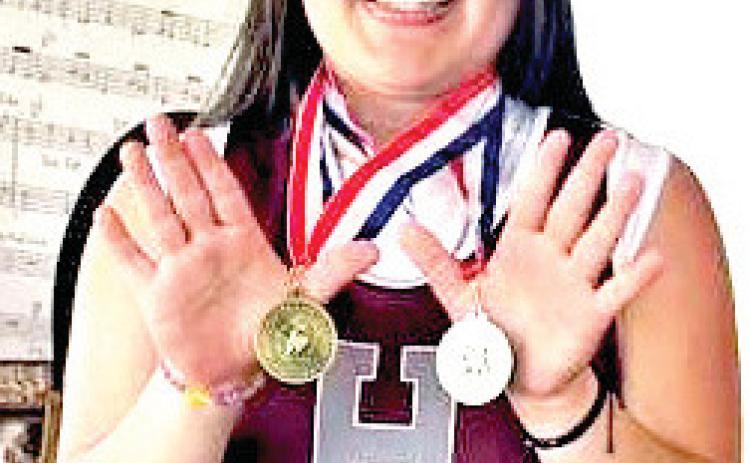 Hart High school Mia Lopez won the discus throw and placed second in shot put.