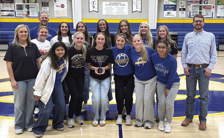 Nazareth’s Madison Brockman was presented her award for being named the 1A Greater Texas Ford Dealers Female Athlete of the Month for February. She was honored for the role she played in leading the Swiftettes to their 27th State Championship. Above, the team is pictured with Whiteface Ford ‘s Jon Galland.