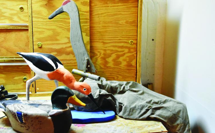 CRAFTSMANSHIP AND SKILL--The crafting of carved decoys to lure wildfowl is an ancient skill held in respect by many waterfowling enthusiasts. Pieces of pine, cedar, and other woods can be transformed with careful strokes of sharp tools and an eye for detail. (Photo by Jim Steiert)