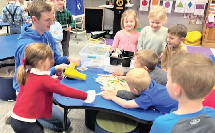 On the 100th day of school at Nazareth ISD, Castro County Extension Agent Felice Acker and Texas 4-H STEM Ambassador Spencer Acker joined the Pre-K kids. Spencer combined STEM with folktales to build houses from straws, popsicle sticks and Legos as a part of the outreach education with schools.