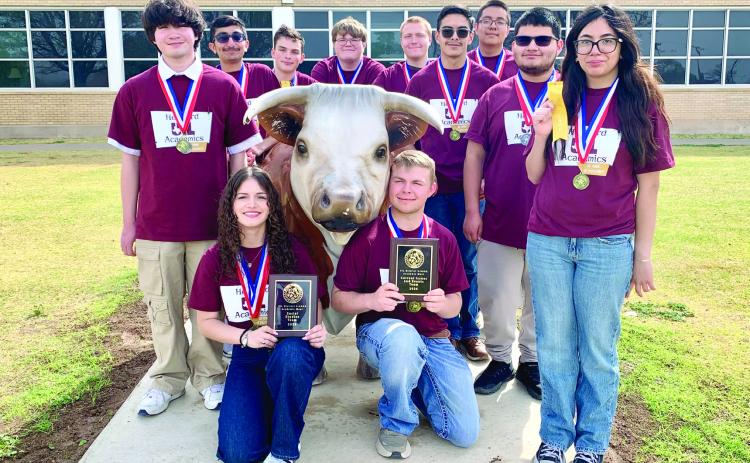 2026 HHS UIL Academic team outside the high school, surrounding the mascot.