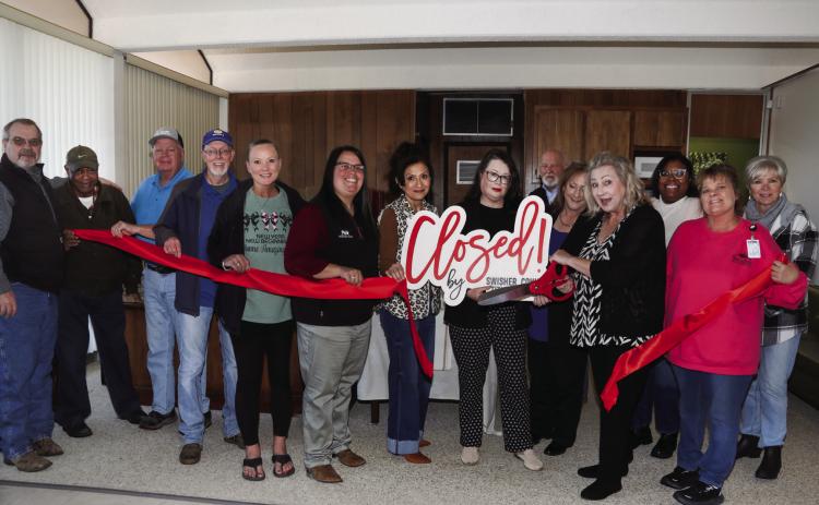 Ribbon Cutting for Swisher County Title Company Left to Right: BJ Potts, Matthew Veals, Frank Reeves, Bryan Ballenger, Kendra Earl, Ashley Wieser, Debbie Garza, Esther Bradley, Pam Shirley, Carla Edwards , Sherry Thornton In the Back: Mike Criswell, Ja’Nell Wafer, Debbie Criswell