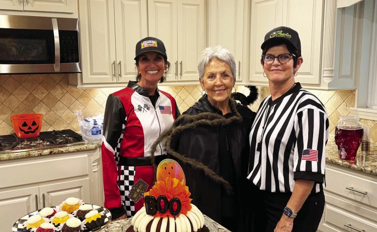La Madre Mia hostesses for their recent Halloween party and sealed bid auction pictured left to right are: Kathie Kerr, Judy Williams and Teresa Allen. (BRAND Photo By Angela Blackmon)