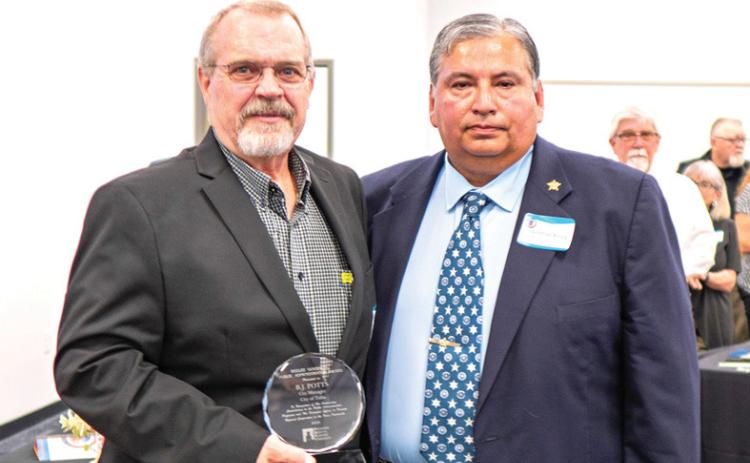 As one of his last duties as PRPC Chairman of the Board of Directors, Castro County Sal Rivera presented former Dimmitt city manager BJ Potts (now Tulia city manager) with the Beelee Goodwin Award at the 2024 PRPC Annual Meeting and Banquet held at the First Responders Academyon Sept. 26 in Amarillo. Rivera will continue to serve on the PRPC Executive Board.