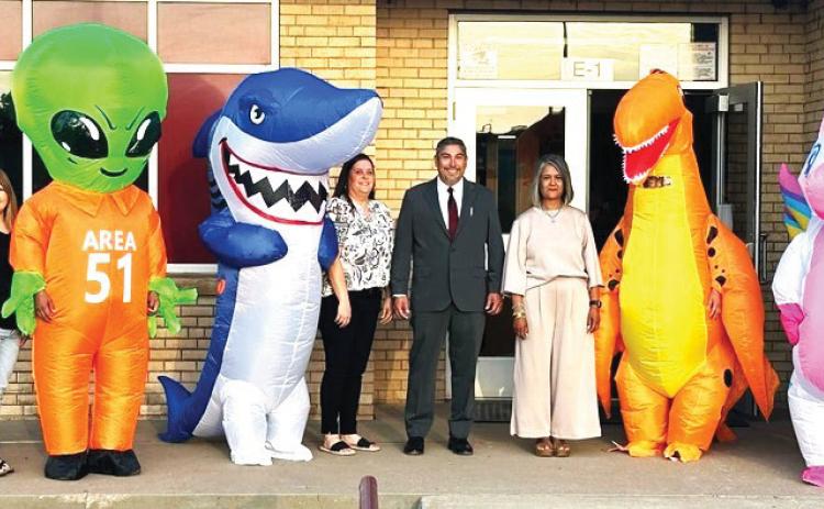 The first day of school saw students greeted by the new superintendent, Juan Dominguez, and other members of the HISD administrative staff – as well as some other bright creatures to spice up the first day.