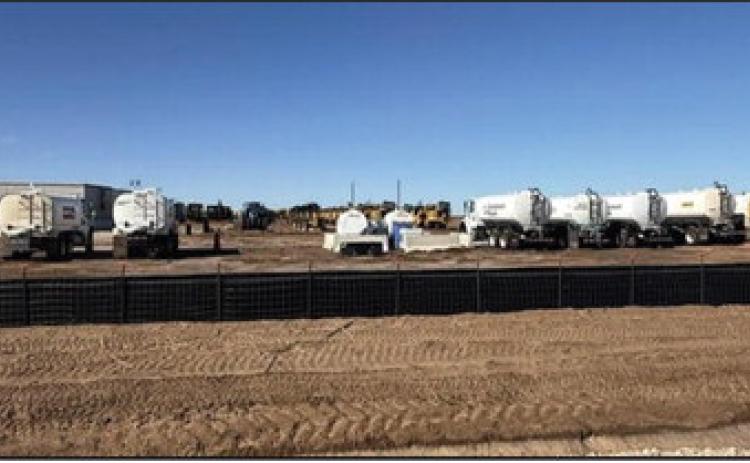 MASSES OF EQUIPMENT--Water trucks and heavy equipment are amassed adjacent to the site of old La Plata, the one-time Deaf Smith County seat as work proceeds on ground preparation for data centers in central Deaf Smith County (Courtesy Photo)