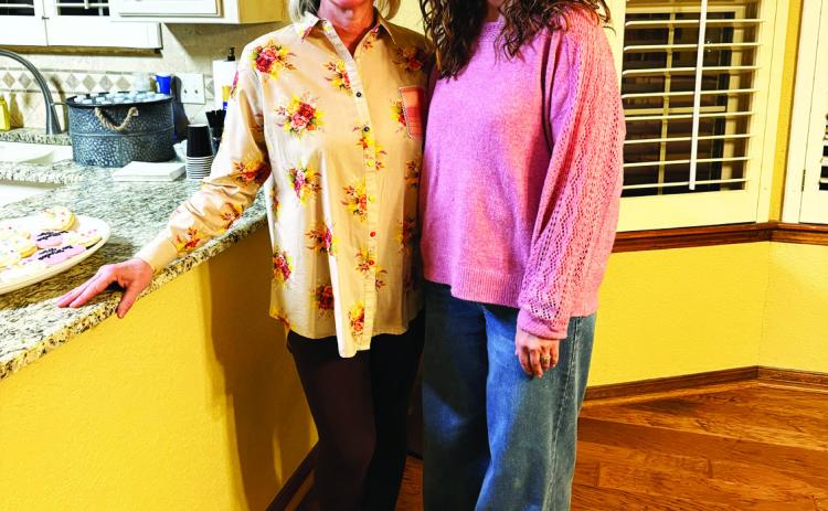 La Madre Mia hostesses for their recent meeting at Cherry Laws’ home on January 22: (left to right) Cherry Laws and Angela Blackmon. (Photo By Angela Blackmon)