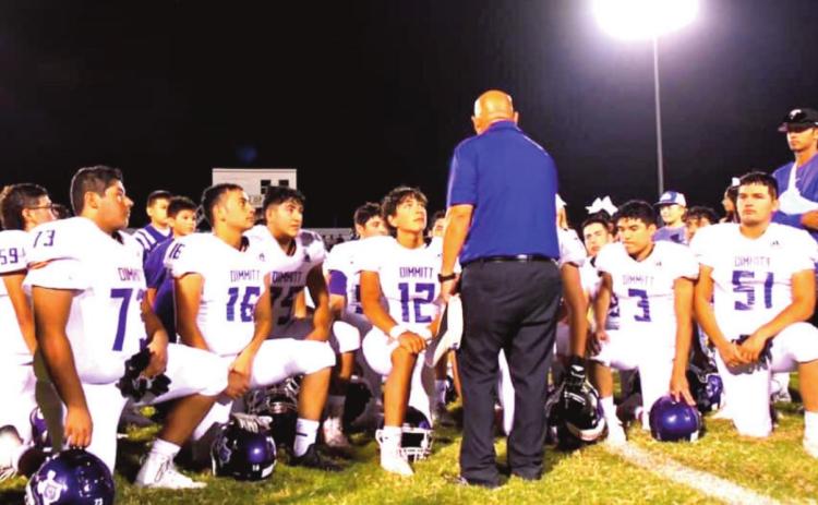 The Dimmitt Bobcats with Coach Johnny Nino following their win against Sunray. (Photo by Crystal Nino)