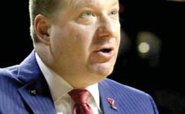 UT basketball coach suspended following arrest