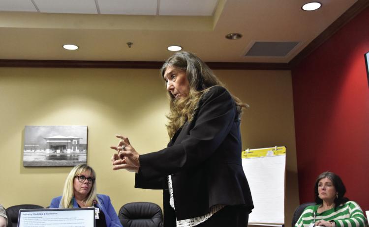 LAYING THE FACTS ON--Debra Whitley and Crista Worley of Forvis Mazars auditors discusses facts relative to the year-end financial audit for 2025 at the February 19 meeting of the Deaf Smith County Hospital District board as hospital CEO Candice Smith and Administrative Assistant Jodi Jordan look on. Whitley was effusive in her praise of CEO Candice Smith in pursuing a refund owed to the Hospital District by the state. (Photo by Jim Steiert))