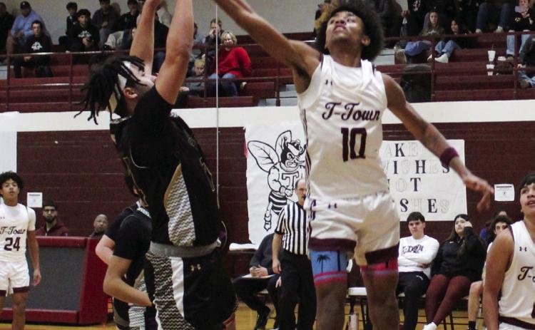CJ Parker and Gavin Mahannah battle for the rebound