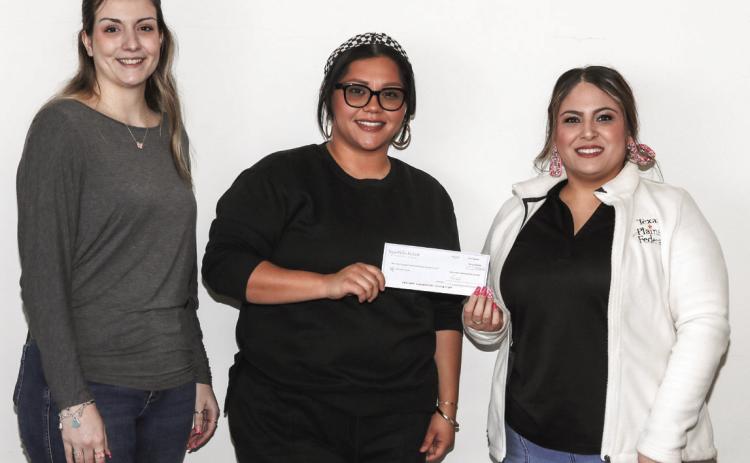 Texas Plains Federal is proud to give our members an opportunity to give back to the community. When you swipe your Community Debit Card on a signature (credit) transaction, we’ll donate a percentage to a charitable organization at no cost to you! Proceeds from the Community Debit were presented to the Youth Athletics Program of Tulia. Krystal Macias accepted the donation from Kawliga Height and April Garza.