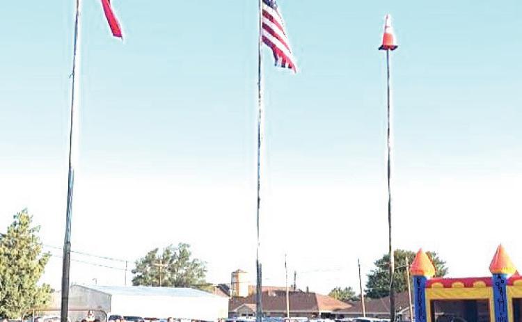 Nazareth ISD FFA chapter had its time honored raising of the flag ceremony on the first day of school, along with some bounce house fun and even a couple of steers gracing the lawn in front of the high school.